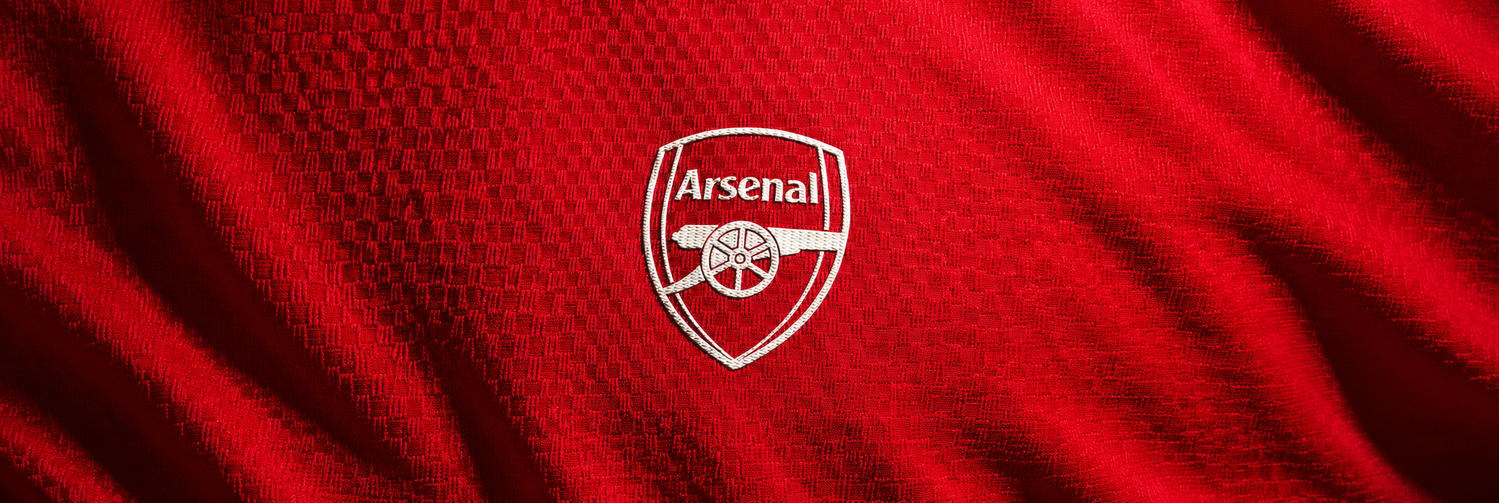 Arsenal FC crest centred on a red fabric panoramic banner