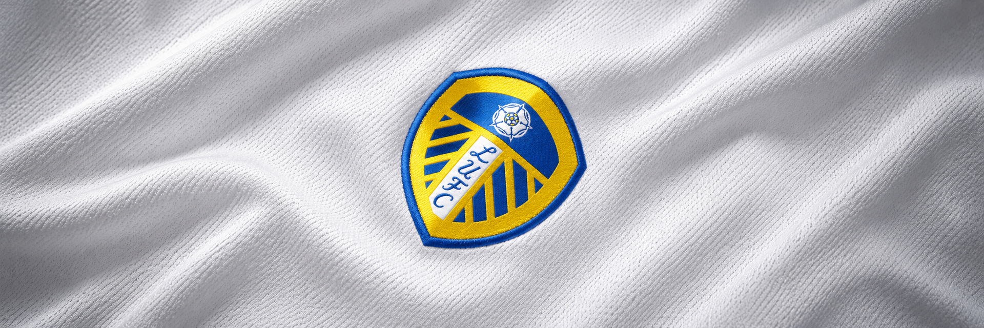 Leeds United crest on club-colour fabric panoramic banner