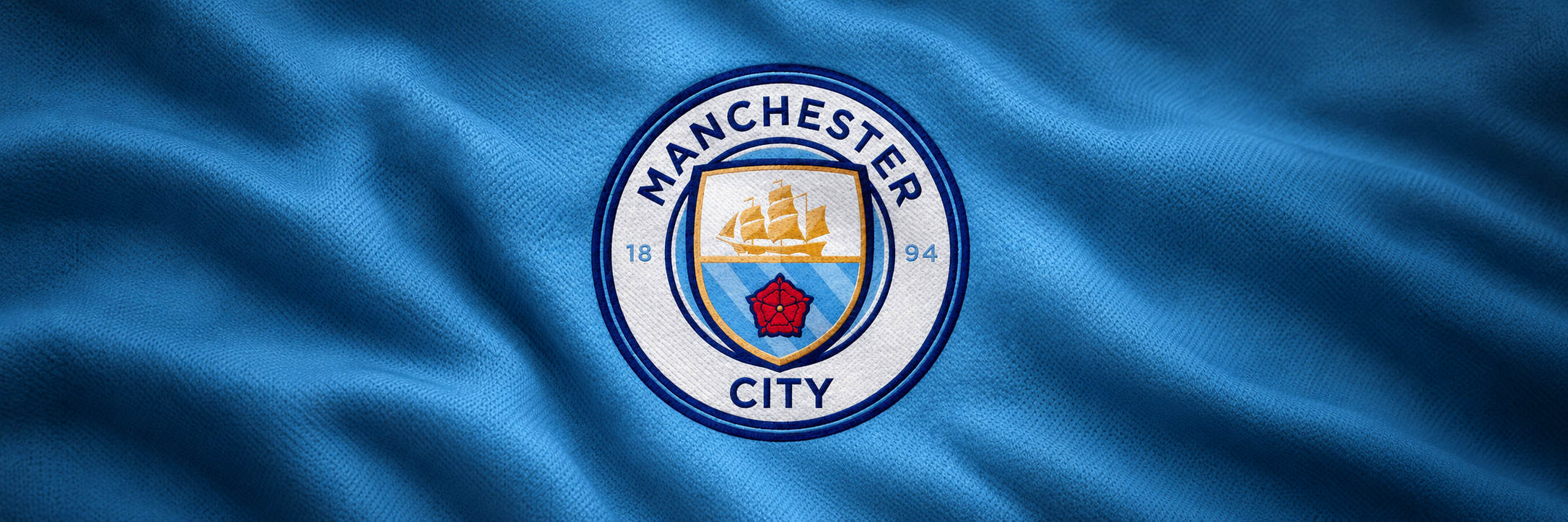Manchester City crest on club-colour fabric panoramic banner