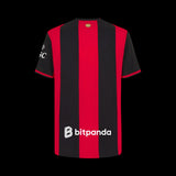 Back view of Kitted Up AC Milan 2026/2027 kids home jersey with red and black vertical stripes and sponsor logos.