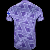 Kitted Up AFC Bournemouth 2026/2027 kids away football jersey in purple with a geometric zigzag pattern, back view.