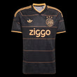 Kitted Up Ajax 2026/2027 kids away football jersey in black with gold accents and subtle graphic pattern
