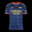 Kitted Up Arsenal 2026/2027 kids away football jersey in navy blue with yellow accents and red collar trim.