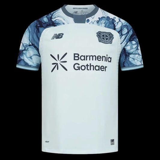 Kitted Up Bayer Leverkusen 2026/2027 away jersey in white with blue marble-patterned sleeves and team crest.