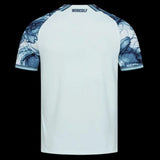 Kitted Up Bayer Leverkusen 2026/2027 kids away jersey back view featuring a light blue body and marble print sleeves.