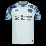 Kitted Up Bayer Leverkusen 2026/2027 kids away jersey in white with blue marble-patterned sleeves and team crest.