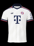 Kitted Up Bayern Munich 2026/2027 kids away jersey in white with navy collar, red and navy sleeve trim, and logos.