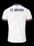 Back view of Kitted Up Bayern Munich 2026/2027 kids away jersey in white with navy and red collar and sleeve trim.