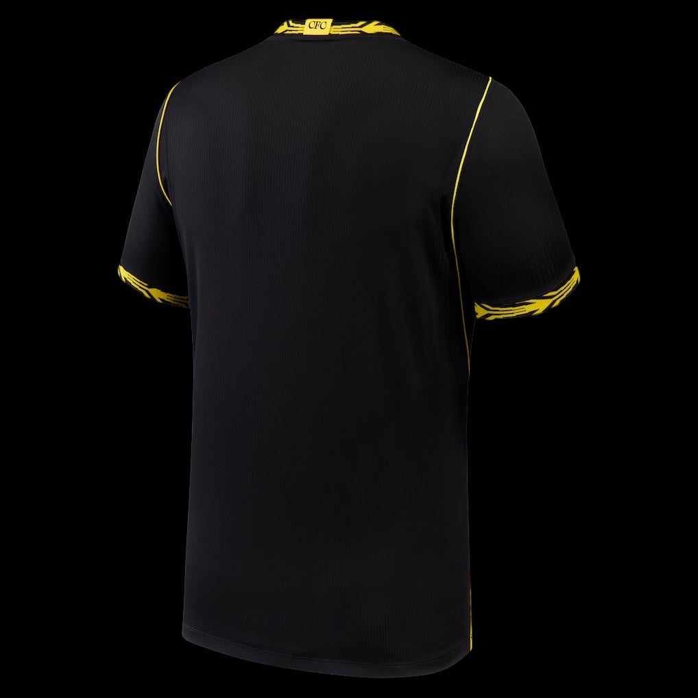 Kitted Up Chelsea 2026/2027 kids away jersey in black with yellow trim and CFC detail on the back collar