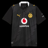 Kitted Up Dortmund 2026/2027 away football jersey in black with yellow accents, white collar, and sponsor logos.