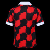 Back view of Kitted Up Fulham 2026/2027 kids away jersey featuring a red and black checkered pattern and white collar.