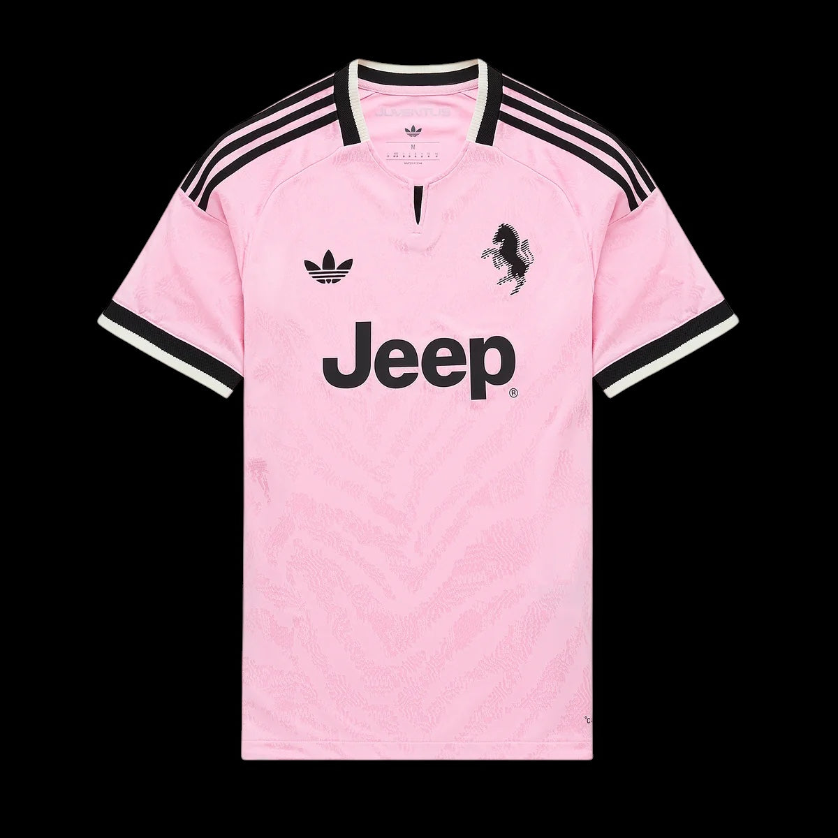 Kitted Up Juventus 2026/2027 kids away jersey in light pink with black Jeep logo, Adidas branding, and zebra pattern.