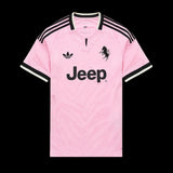 Kitted Up Juventus 2026/2027 kids away jersey in light pink with black Jeep logo, Adidas branding, and zebra pattern.