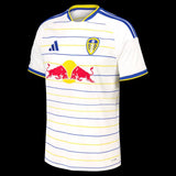 Kitted Up Leeds 2026/2027 kids home football jersey in white with blue and yellow horizontal stripes and team crest.