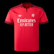 Kitted Up Lyon 2026/2027 away football jersey in red with subtle vertical stripes and dark red patterned trim.