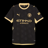 Kitted Up Manchester City 2026/2027 kids away jersey in black with gold bee pattern and team branding