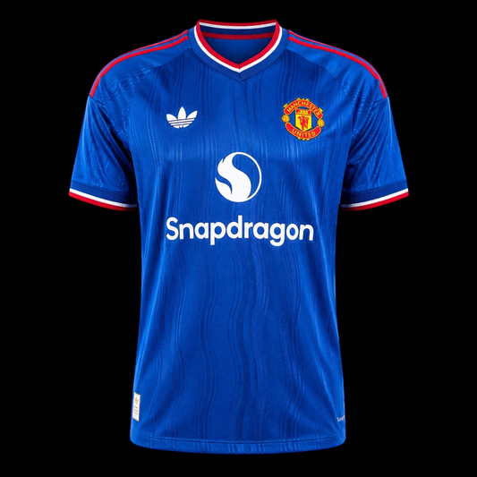 Kitted Up Manchester United 2026/2027 kids away jersey in blue with red and white trim and club crest.