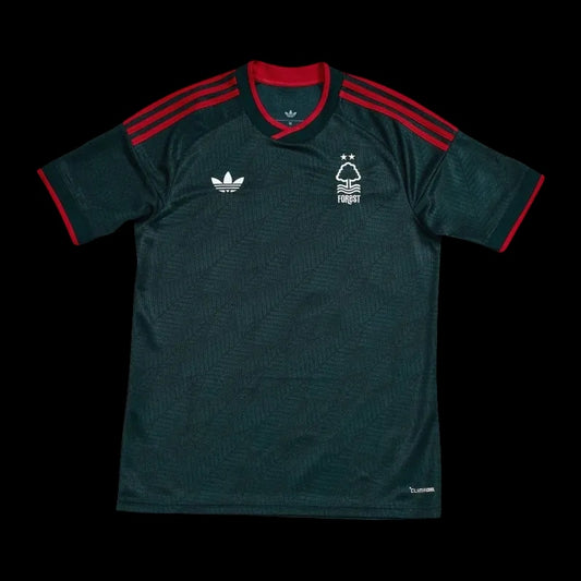 Kitted Up Nottingham Forest 2026/2027 away football jersey in dark green with red accents and white logos.