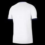 Back view of the white Kitted Up PSG 2026/2027 away football jersey with navy blue collar and sleeve trim.