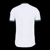 Back view of the white Kitted Up Real Madrid 2026/2027 home jersey featuring dark green trim on collar and sleeves.