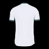 Back view of Kitted Up Real Madrid 2026/2027 kids home jersey in white with dark green and maroon trim details.