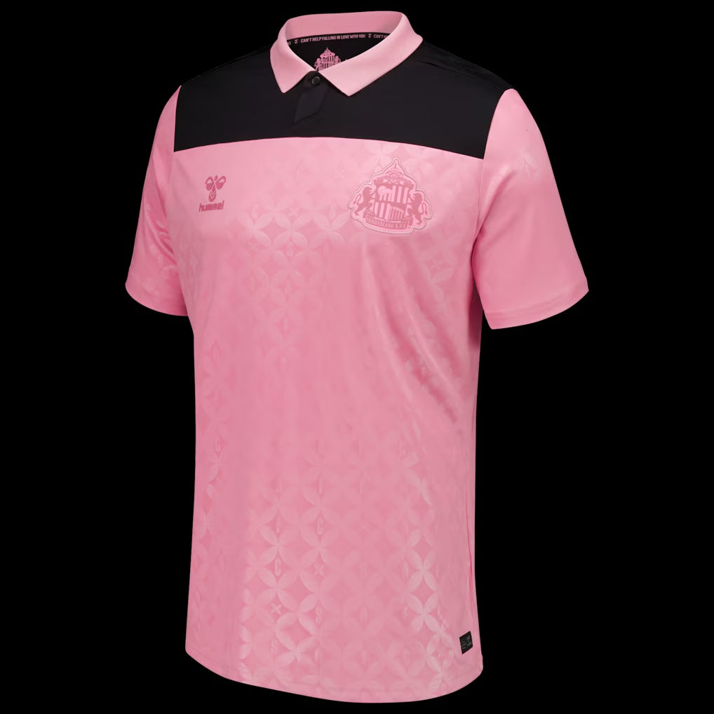 Kitted Up Sunderland 2026/2027 kids away football shirt in pink and black with a polo collar and patterned fabric.
