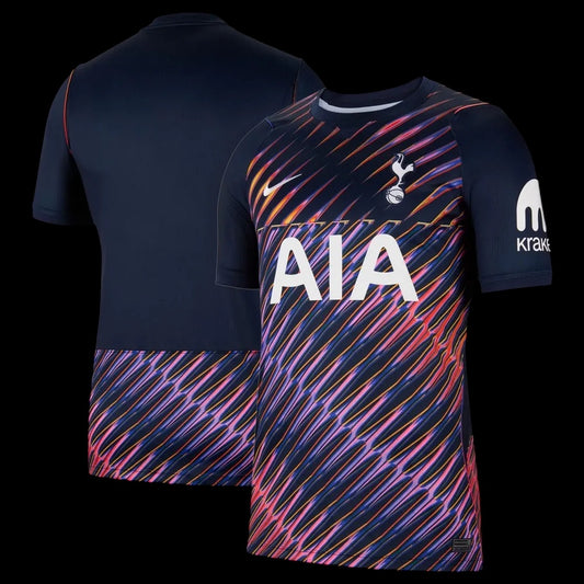 Kitted Up Tottenham Hotspur 2026/2027 away jersey featuring a dark navy base with vibrant pink and blue graphic print